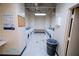 Community laundry room featuring multiple washing machines for residents at 20 Marietta St. Nw #12D, Atlanta, GA 30303