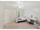 Bedroom featuring an open door and a white desk near a natural light window at 6795 Preston Glen Dr, Alpharetta, GA 30005