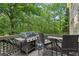 Outdoor deck with grill and seating at 6795 Preston Glen Dr, Alpharetta, GA 30005