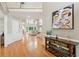 Grand foyer with hardwood floors, high ceilings, and an open staircase at 6795 Preston Glen Dr, Alpharetta, GA 30005