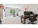 Home gym featuring a desk, work space, work out equipment, and a bright window at 6795 Preston Glen Dr, Alpharetta, GA 30005