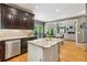 Modern kitchen with stainless steel appliances and a marble island at 6795 Preston Glen Dr, Alpharetta, GA 30005