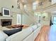Grand living room with soaring ceilings, fireplace, staircase, and abundant natural light at 6795 Preston Glen Dr, Alpharetta, GA 30005