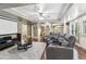 Movie room featuring seating for three with a projector and a flat screen for viewing at 6795 Preston Glen Dr, Alpharetta, GA 30005