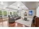 Movie room featuring seating for three with a projector and a flat screen for viewing at 6795 Preston Glen Dr, Alpharetta, GA 30005