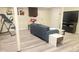 Finished basement with seating area and laminate floors at 3629 Embry Cir, Atlanta, GA 30341
