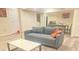 Finished basement features a sofa, dining area, and a functional laundry space at 3629 Embry Cir, Atlanta, GA 30341