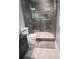 Modern bathroom with a tiled shower and glass door, offering a spa-like experience at 3629 Embry Cir, Atlanta, GA 30341