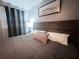 Cozy bedroom featuring a stylish bed with decorative pillows and ambient lighting at 3629 Embry Cir, Atlanta, GA 30341