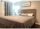 Tranquil bedroom featuring a plush bed, wooden accents, and soft natural lighting at 3629 Embry Cir, Atlanta, GA 30341
