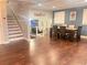 Open dining room with hardwood floors and staircase at 3629 Embry Cir, Atlanta, GA 30341