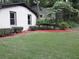 Brick home exterior with well-manicured lawn and fresh mulch at 3629 Embry Cir, Atlanta, GA 30341