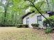Charming brick home exterior with a well-maintained lawn and lush greenery at 3629 Embry Cir, Atlanta, GA 30341