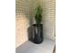 Front porch featuring a large, sleek, black flower pot at 3629 Embry Cir, Atlanta, GA 30341
