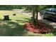 Well-maintained front yard with mature trees and tidy landscaping at 3629 Embry Cir, Atlanta, GA 30341