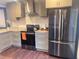 Well-equipped kitchen with granite countertops, stainless steel appliances, and ample cabinet space at 3629 Embry Cir, Atlanta, GA 30341