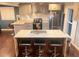 Spacious kitchen with granite counters, stainless steel appliances, and a convenient island with breakfast bar at 3629 Embry Cir, Atlanta, GA 30341