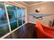 View of modern living room highlighting floor-to-ceiling windows and outdoor patio area at 3629 Embry Cir, Atlanta, GA 30341