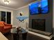 Inviting living room area with a fireplace, TV and modern decor at 3629 Embry Cir, Atlanta, GA 30341