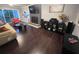 Spacious living room featuring hardwood floors, a cozy fireplace, and ample natural light at 3629 Embry Cir, Atlanta, GA 30341