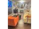 Open-concept living room area featuring comfortable seating, modern decor, and hardwood floors at 3629 Embry Cir, Atlanta, GA 30341
