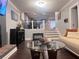 Open-concept living area showcasing stylish furnishings and smooth hardwood flooring at 3629 Embry Cir, Atlanta, GA 30341
