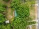 Aerial view of lot amongst mature trees, close to neighborhood streets at 5766 Macland Rd, Powder Springs, GA 30127