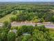 Wide angle aerial view of lot surrounded by a mature tree canopy at 5766 Macland Rd, Powder Springs, GA 30127