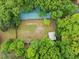 Bird's eye view of home, lot, and backyard shows mature trees at 5766 Macland Rd, Powder Springs, GA 30127