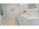 This bathroom features a double vanity and walk in shower at 5766 Macland Rd, Powder Springs, GA 30127