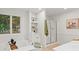 Bright bathroom boasts a separate shower, bathtub, and natural light from the window at 5766 Macland Rd, Powder Springs, GA 30127