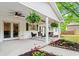 Inviting covered porch with outdoor seating and ceiling fans, perfect for relaxing outdoors at 5766 Macland Rd, Powder Springs, GA 30127