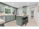 Charming kitchen with stainless steel appliances, breakfast bar, and plenty of cabinet space at 5766 Macland Rd, Powder Springs, GA 30127