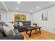 Living room featuring hardwood floors, recessed lighting, and sliding glass door at 5766 Macland Rd, Powder Springs, GA 30127