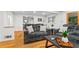 Bright living room featuring hardwood floors, recessed lighting, and comfortable seating at 5766 Macland Rd, Powder Springs, GA 30127