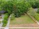 Expansive lot offers a wonderful canvas for new home construction amidst mature trees at 5766 Macland Rd, Powder Springs, GA 30127