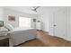 Clean bedroom with ceiling fan and dresser offers comfort at 639 W Ponce De Leon Ave, Decatur, GA 30030