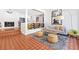 Cozy living room featuring stylish decor, a brick fireplace, and an open layout at 639 W Ponce De Leon Ave, Decatur, GA 30030