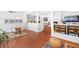 Open concept living area with views of the kitchen, dining and living rooms and fireplace at 639 W Ponce De Leon Ave, Decatur, GA 30030