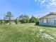 Large grassy yard with trees bordering property at 72 Hazelwood Nw Rd, Cartersville, GA 30121
