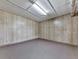 Unfinished basement featuring wood paneling and a concrete floor at 72 Hazelwood Nw Rd, Cartersville, GA 30121