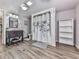 Full bathroom featuring shower with leaf-patterned curtain, modern vanity, and tile flooring at 72 Hazelwood Nw Rd, Cartersville, GA 30121