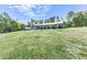 Inviting home with a sunroom and a large, well-maintained lawn at 72 Hazelwood Nw Rd, Cartersville, GA 30121