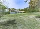 Ranch-style home with a sunroom and a sprawling front lawn at 72 Hazelwood Nw Rd, Cartersville, GA 30121