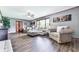 Comfortable living room features wood trim, neutral decor, and wood-look floors at 72 Hazelwood Nw Rd, Cartersville, GA 30121