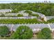 Aerial view of the community showcasing townhomes with decks and lush trees in a vibrant setting at 863 Commonwealth Se Ave, Atlanta, GA 30312