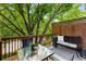 Cozy porch with outdoor seating and a view of lush greenery at 863 Commonwealth Se Ave, Atlanta, GA 30312