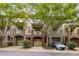 Charming townhome with brick accents, covered porch, and attached garage at 863 Commonwealth Se Ave, Atlanta, GA 30312
