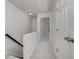 Bright hallway with access to rooms, closet, and staircase at 863 Commonwealth Se Ave, Atlanta, GA 30312
