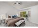 Spacious main bedroom featuring a large bed, ceiling fan, and serene decor at 863 Commonwealth Se Ave, Atlanta, GA 30312